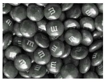 M&M milk chocolate candies with black coating in 10 pound bulk packaging for wholesale retail distribution