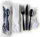 Walco black disposable cutlery kit with fork, knife, spoon, napkin, and salt and pepper packets