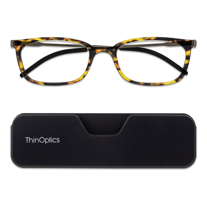ThinOptics Tortoise Frame Connect Reading Glasses and a sleek black Connect case: minimalist design with thin lenses. The compact, polycarbonate case offers a modern, portable solution for individuals needing reading glasses.